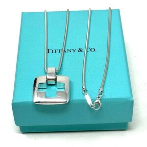 Authentic Tiffany &Co Stencil cutout Cross Pendant Necklace.